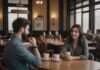 Bird Test Relationship: The Dating Trend Explained—and Whether It Actually Matters Two adults talking across a cafe table with plain white cups.