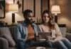AI Relationship Advice: The Things Couples Wish They Had Understood Earlier Two adults sitting closely together on a sofa while looking at a tablet.