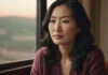 Standards vs. Settling: What Healthy Compromise Really Means in Dating A person reflecting calmly on personal boundaries and relationship choices.