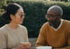 The Psychology of Making the First Move Without Looking Desperate Two adult partners sharing an everyday moment of connection.