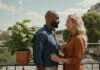 After the Honeymoon Phase: Save Your Relationship Two adults talking on a balcony beside a basil plant.