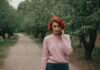 When Divorce Is a Healthy Choice Without Betrayal Woman walking along a leafy park path.