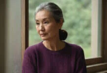 Am I in a Situationship Quiz? A Clearer Way to Read What’s Really Happening Woman sitting quietly beside a bright window.