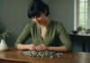 Why Pairing Mood and Habit Tracking Reveals Hidden Truths A woman arranging smooth stones during a mood and habit check-in.