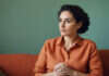 Healthy Relationship Standards: How to Tell What Really Matters Before Chemistry Makes the Decision for You Woman sitting quietly in a bright room.