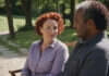 Communication Skills for Strong Relationships Two adults walking together through a garden.