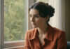 Signs Your Partner Doesn’t Respect Your Boundaries: How to Protect Your Peace Without Starting a War Woman sitting quietly beside a bright window.