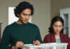 Marriage and Family Life: Roles, Parenting, and Equality Two partners sharing a household task beside a laundry basket.